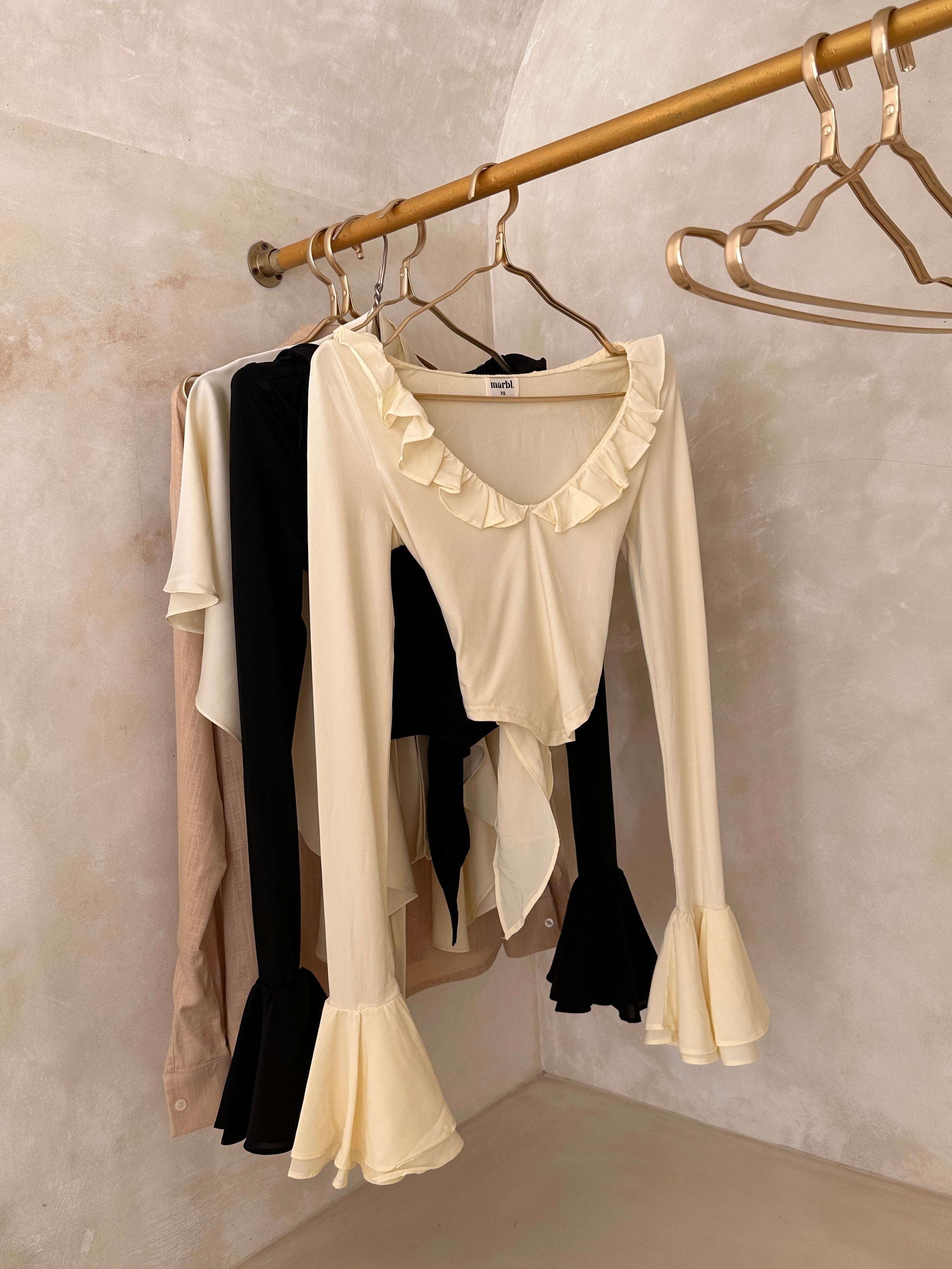 Soraya Ruffle Top – Feminine Flow